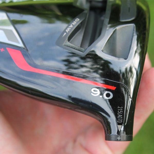 TaylorMade tour issue club head showing serial number sticker