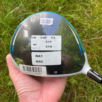 Collection of tour issue club heads on display